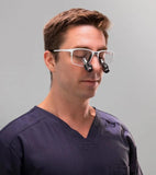 Veterinary practitioner wearing Q-Optics Prismatic loupes
